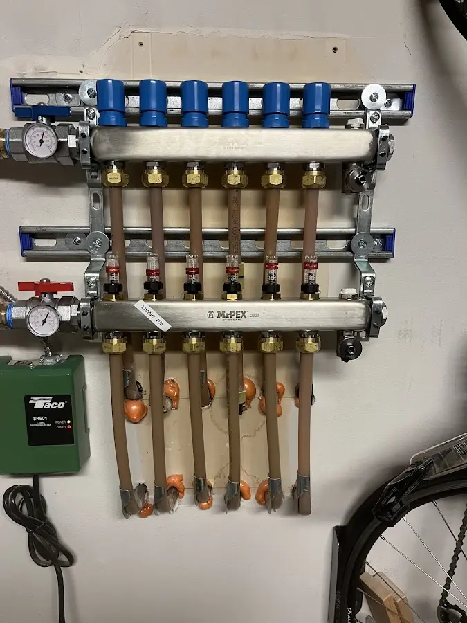 Plumber performing Gas Line Installation at a residential property in Grass Lake